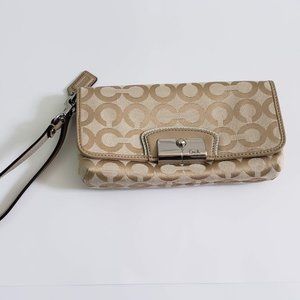 Coach signature gold pouch